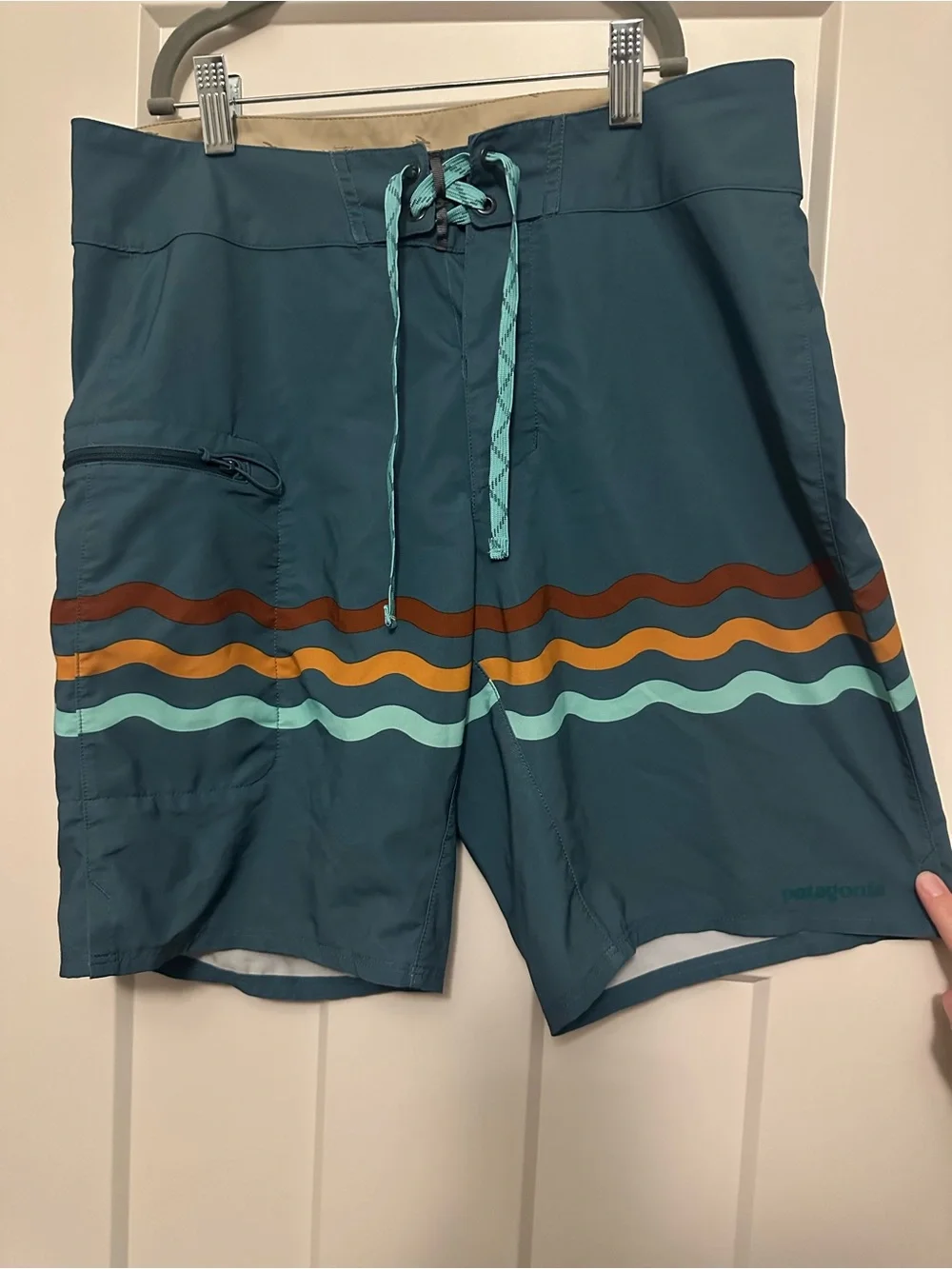 Patagonia Teal Board Shorts with Multicolor Wave Stripes